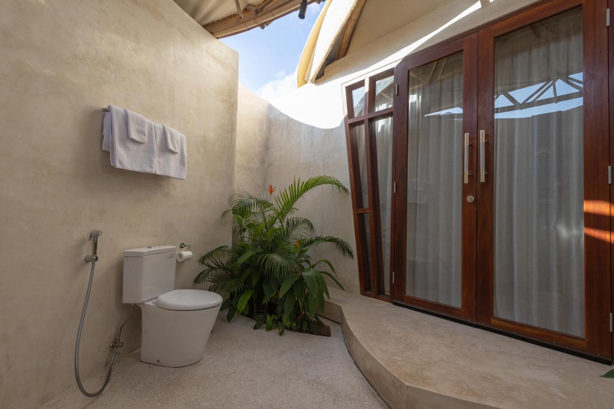 Nuanu Suites & Accommodations Tanah Lot Kamer foto